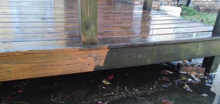 Deck cleaning service in process
